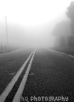 Endless Foggy Road black and white picture