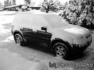 Ford Escape Covered in Snow black and white picture