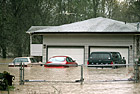 Cars Flooded in River photo thumbnail