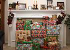 Christmas Presents Under Fire Mantel photo thumbnail