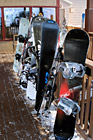 Row of Snowboards & Skis photo thumbnail