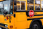 Side Front View of School Bus photo thumbnail