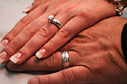 Wedding Rings on Hands photo thumbnail