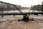 Flooded River Under Bridge photo thumbnail