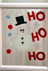 Snowman Decoration on Glass Door photo thumbnail