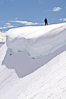 Man Standing Near a Snow Overhang photo thumbnail
