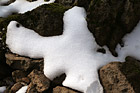 Snow on Rocks Close Up photo thumbnail