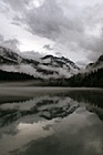 Vertical Diablo Lake Dramatic Clouds, Fog, and Reflection photo thumbnail