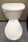 White Toilet With Seat Down photo thumbnail
