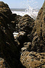 Ocean Waves Splashing on Rocks photo thumbnail