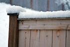 Snow Falling on Fence photo thumbnail
