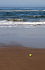 Tennis Ball on Beach photo thumbnail