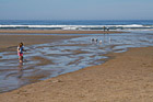Beach, Seagulls & Child Playing photo thumbnail