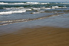 Ocean Waves Along Beach photo thumbnail