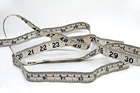 Measuring Tape on White Background photo thumbnail