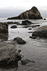 Ocean Rocks Along Beach photo thumbnail