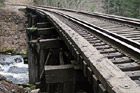Railroad Tracks Over Bridge photo thumbnail