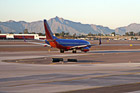 Soutwest Airplane on Runway photo thumbnail