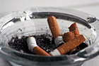 Cigarettes in Ashtray photo thumbnail