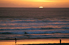Sun Setting Behind Pacific Ocean photo thumbnail
