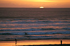 Sun Setting Behind Pacific Ocean photo thumbnail