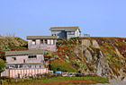 Three Coastal Houses on Hill photo thumbnail