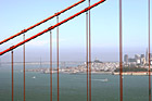 Bay Bridge seen through Golden Gate Bridge photo thumbnail