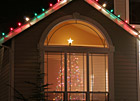 Christmas Tree Seen Through Window photo thumbnail