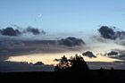 Crescent Moon, Sunset, & Hill Silhouette photo thumbnail