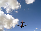 Airplane Overhead in Sky photo thumbnail