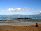 Kid Playing in Sand photo thumbnail