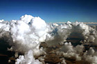 Blue Sky & Puffy Clouds taken from Above photo thumbnail