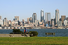 Man Walking Along Alki Beach photo thumbnail