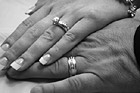 Black & White Wedding Rings on Hands preview