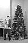 Black & White Santa Claus Holding a Present preview