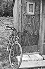 Black & White Old Bicycle Leaning Against Shed preview