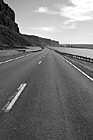 Black & White Road Between Lake and Cliff preview
