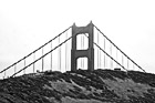 Black & White Tip of Golden Gate Bridge Behind Hill preview