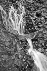 Black & White Small Waterfall on Rock Wall preview