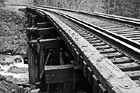 Black & White Railroad Tracks Over Bridge preview