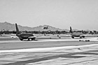 Black & White Planes Taxing and Landing at Airport preview