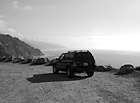 Black & White Ford Escape on Dirt Road Ocean View preview