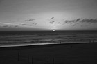 Black & White Sun Setting Behind Ocean preview