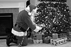 Black & White Santa Delivering Presents preview