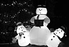 Black & White Blow-up Snowmen at Night preview