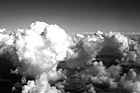 Black & White Blue Sky & Puffy Clouds taken from Above preview