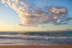 Sunset and Waves Crashing Kauai, Hawaii