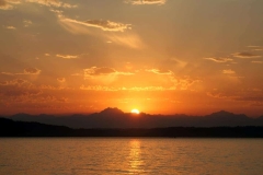 Very Orange Sunset and Olympic Mountains